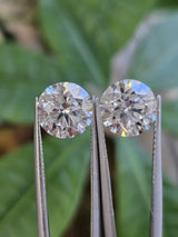 IGI 2.55CT + 2.55CT ROUND PAIR D VS1