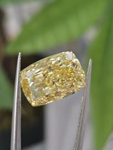 IGI 7.25CT CUSHION FANCY VIVID YELLOW VS1