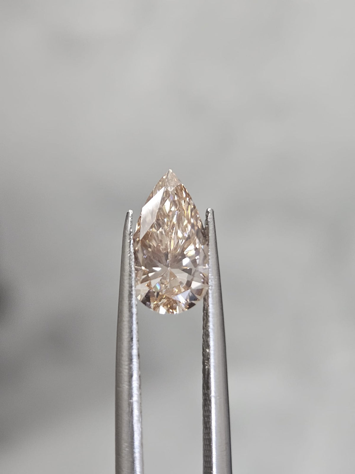IGI 1.01CT PEAR FANCY LIGHT PINKISH BROWN VS1