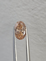 IGI 1.51CT OVAL FANCY PINKISH BROWN VS2