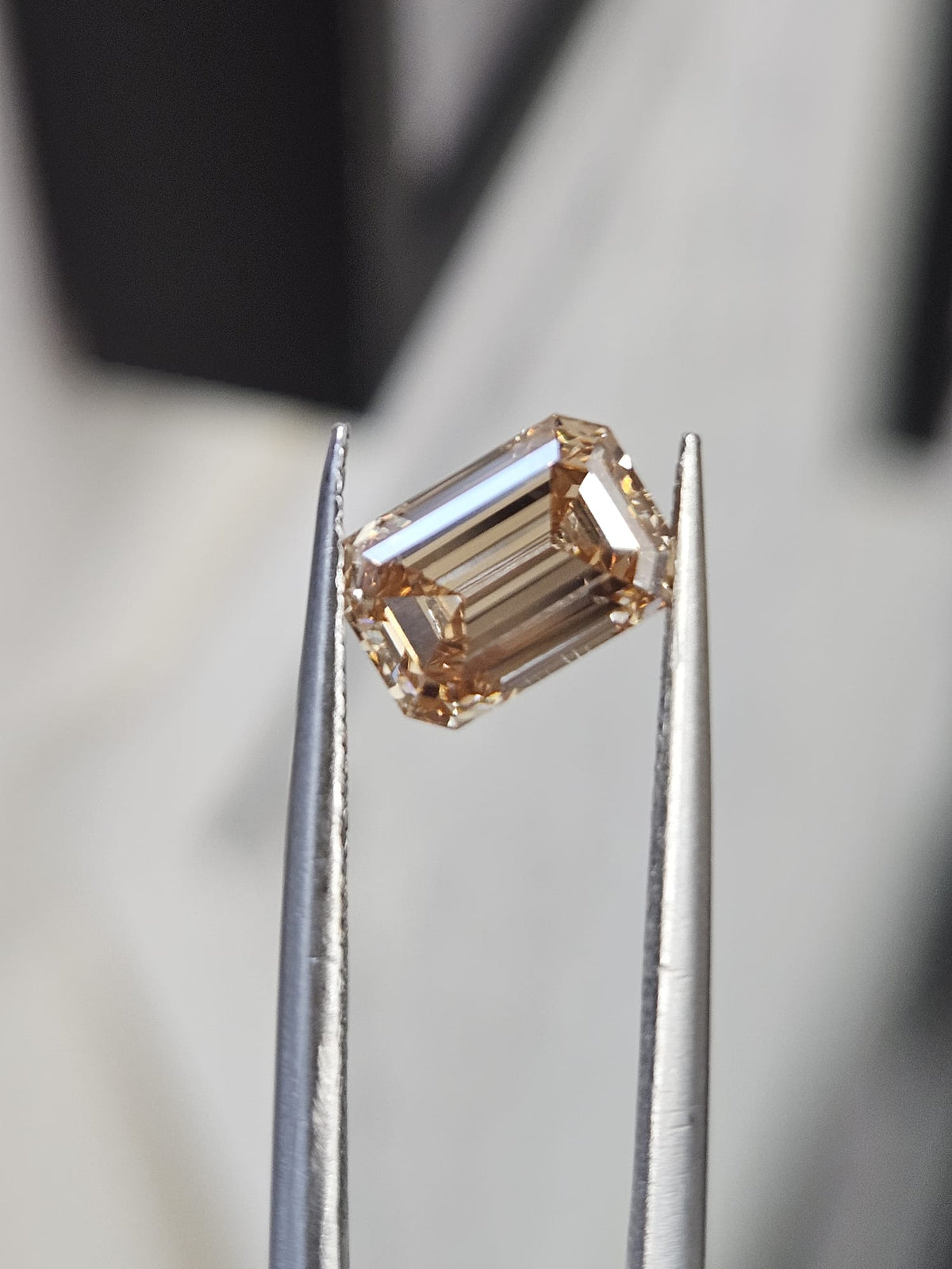 IGI 1.25CT EMERALD FANCY LIGHT PINKISH BROWN VS1