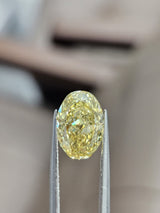 IGI 3.01CT OVAL FANCY VIVID YELLOW VS1