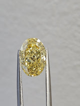 IGI 3.01CT OVAL FANCY VIVID YELLOW VS1