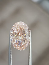 IGI 5.05CT OVAL FANCY VIVID PINK VS2