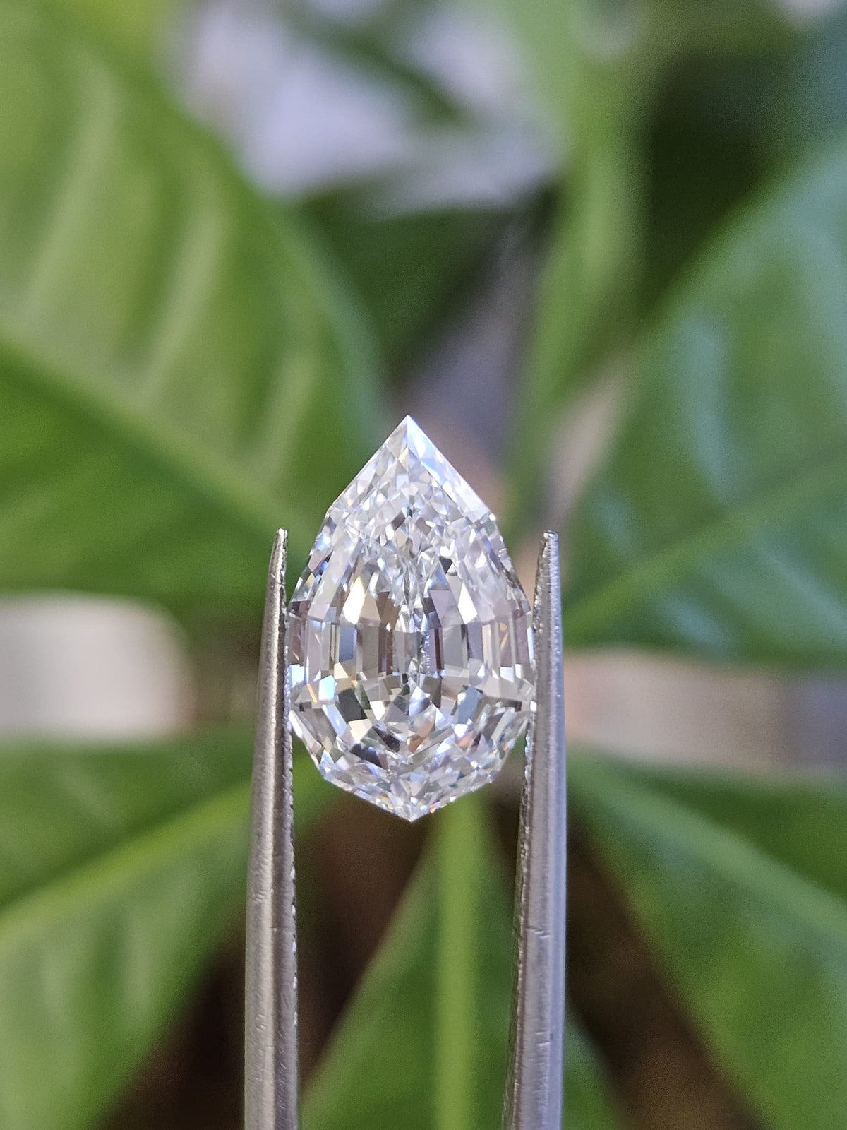 IGI 3.33CT PEAR STEP CUT D VVS2