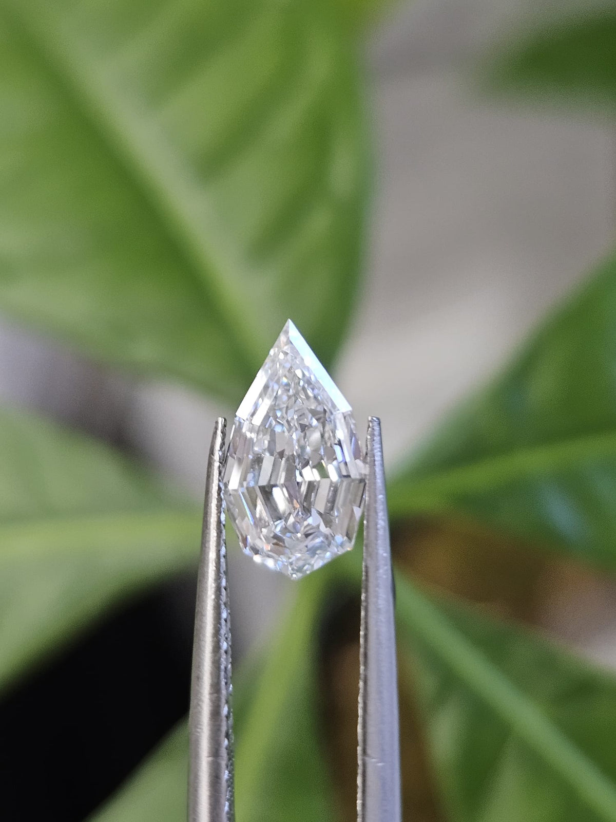 IGI 1.04CT PEAR STEP CUT E VVS2
