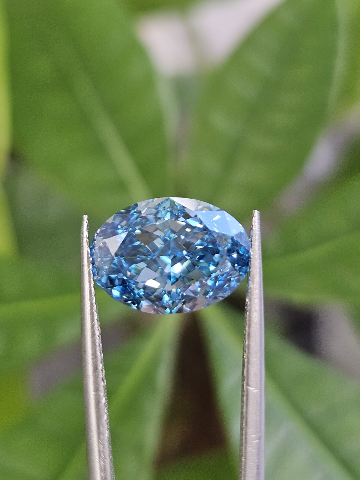 IGI 4.05CT OVAL FANCY VIVID BLUE VVS2