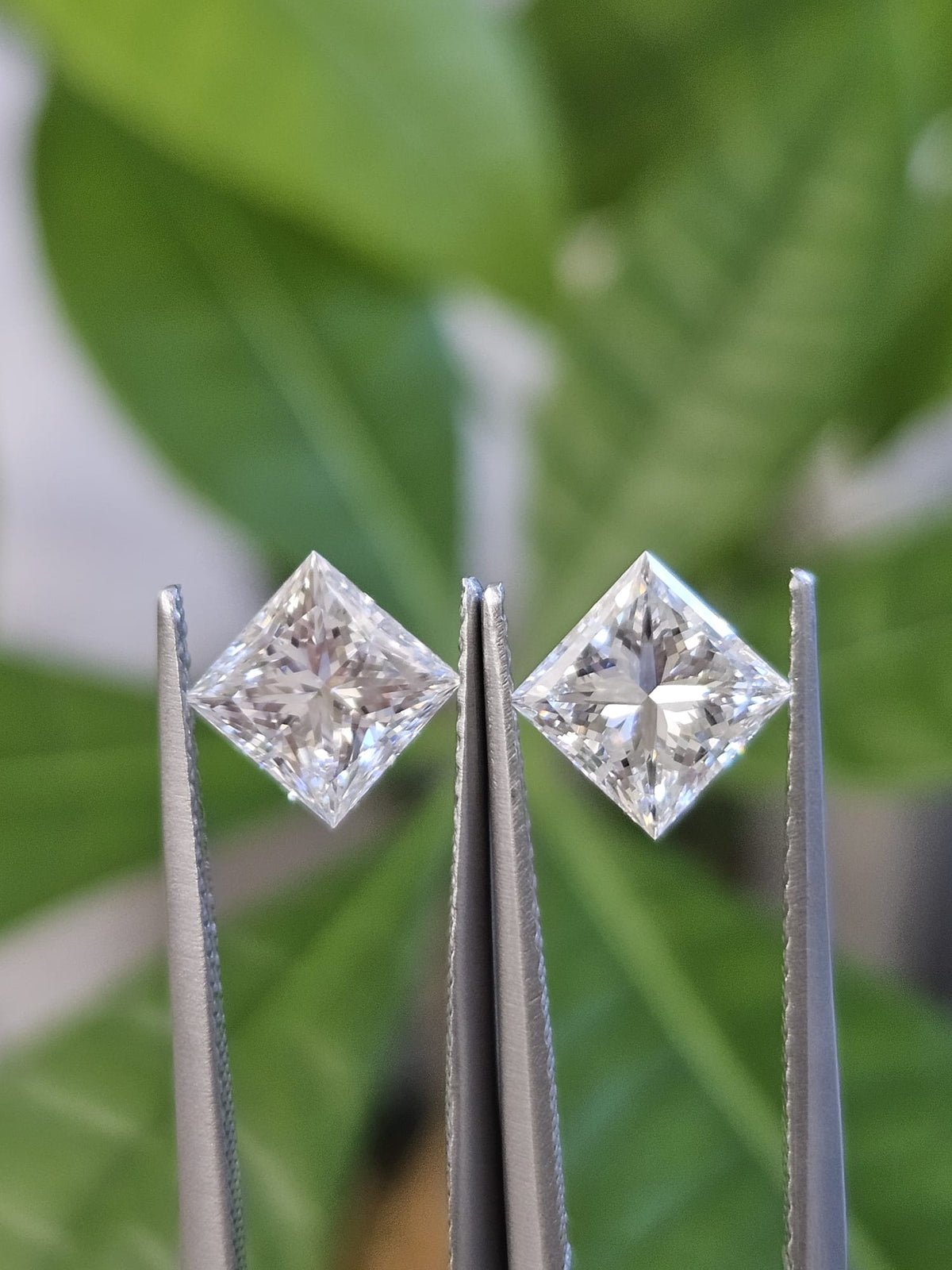 IGI 1.01CT + 1.05CT PRINCESS PAIR E VVS2 + D VVS1