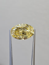IGI 5CT OVAL FANCY INTENSE YELLOW VS1