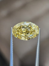 IGI 5CT OVAL FANCY INTENSE YELLOW VS1