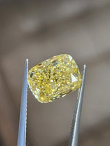 IGI 5.09CT CUSHION FANCY VIVID YELLOW VS2