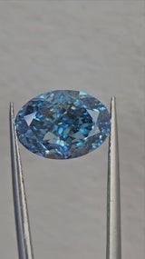 IGI 4.05CT OVAL FANCY VIVID BLUE VVS2