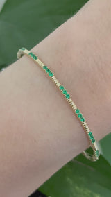Yellow gold emerald flex bracelet
