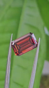 IGI 4.09CT EMERALD FANCY DEEP ORANGE VS1