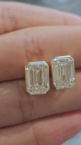 IGI 2.54ct + 2.54ct Emerald Cut Bezel Stud in Yellow Gold