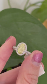 White gold oval lab diamond and white lab diamond ring