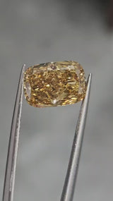 IGI 3.04CT CUSHION FANCY VIVID BROWNISH YELLOW VS2