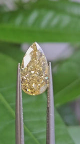 IGI 3.01CT PEAR FANCY VIVID YELLOW VS2