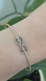 Yellow gold sapphire infinity flex bracelet
