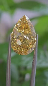 IGI 8.10CT PEAR FANCY VIVID YELLOW VS1