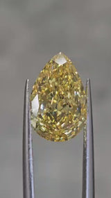 IGI 5.07CT PEAR FANCY VIVID YELLOW VS1