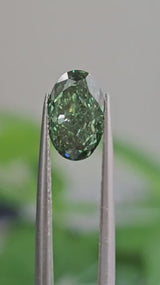 IGI 1.77CT OVAL FANCY VIVID GREEN VS2
