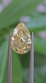 IGI 3.06CT PEAR FANCY VIVID YELLOW VS1