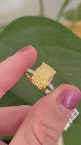 Yellow gold elongated cushion cut yellow lab diamond and white lab diamond ring