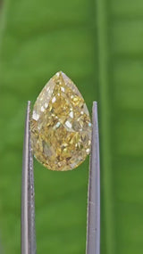 IGI 3.04CT PEAR FANCY VIVID YELLOW VS2