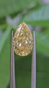 IGI 3.04CT PEAR FANCY VIVID YELLOW VS2