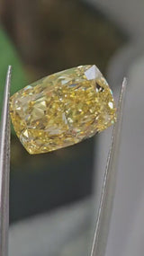 IGI 7.25CT CUSHION FANCY VIVID YELLOW VS1
