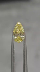IGI 1.17CT PEAR FANCY VIVID YELLOW VS2
