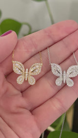 Butterfly necklaces with baguette and round diamonds available in white and yellow gold