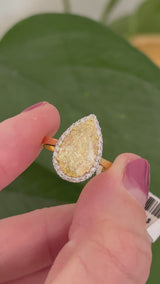 Yellow gold pear shape yellow lab diamond and white lab diamond ring