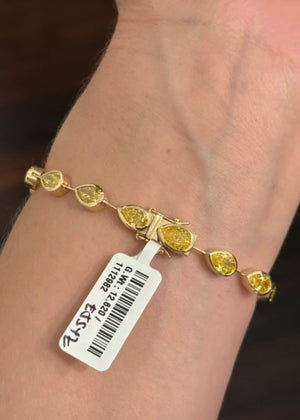 Yellow gold bezel set 10.93ct yellow pear shape lab diamond bracelet