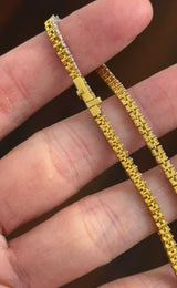 15.29ct Yellow Gold with White Gold Prongs graduated 16.5" Tennis Necklace
