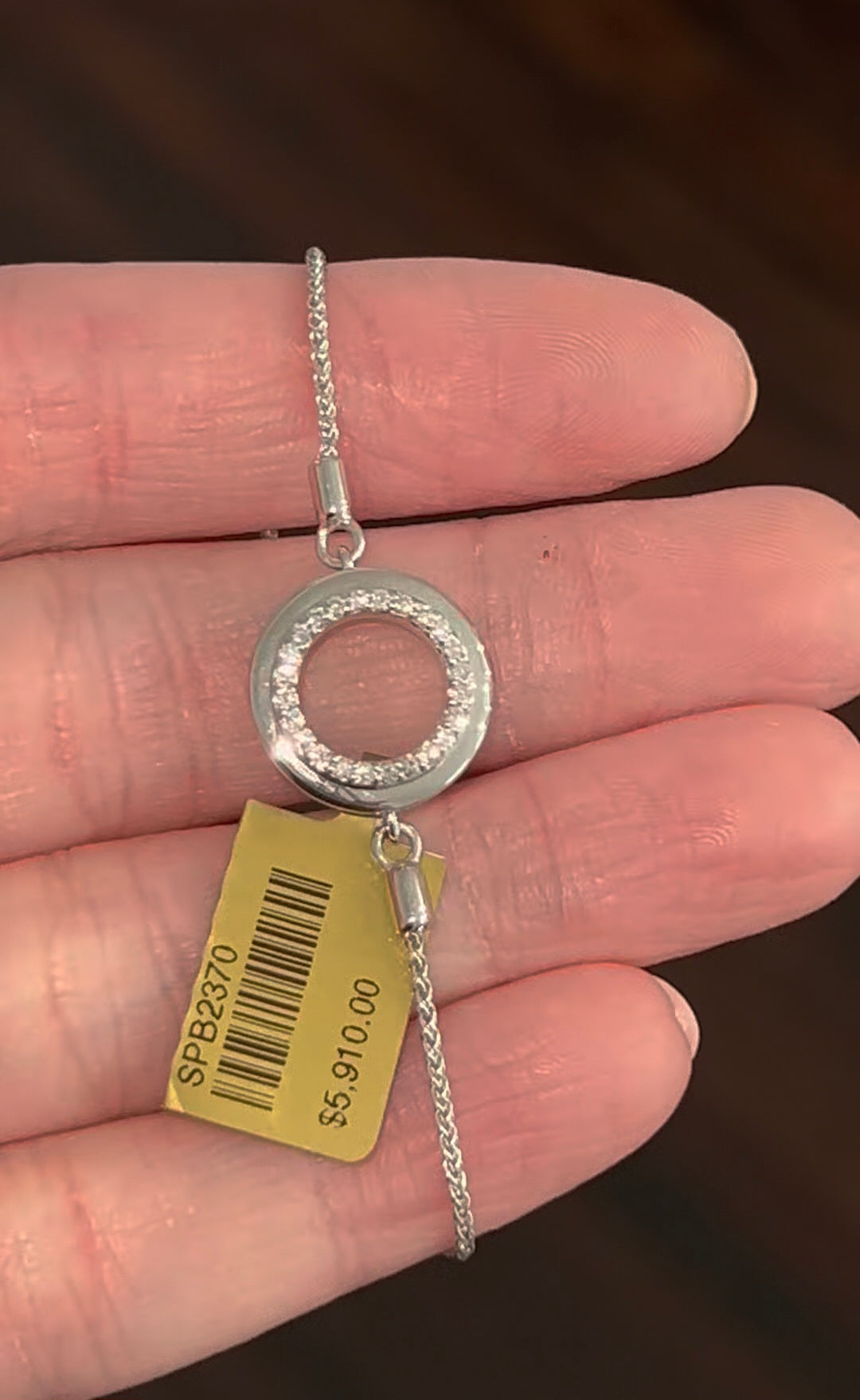 White gold lab diamond
bracelet with an adjustable bolero chain