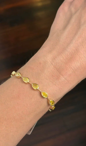 Yellow gold bezel set 10.93ct yellow pear shape lab diamond bracelet