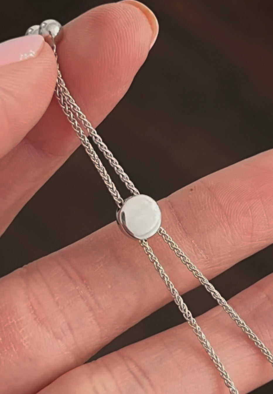 White gold lab diamond
bracelet with an adjustable bolero chain