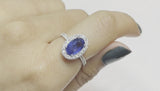 Oval Blue Sapphire Diamond Halo Ring