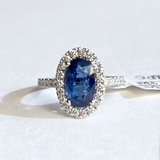 Oval Blue Sapphire Diamond Halo Ring