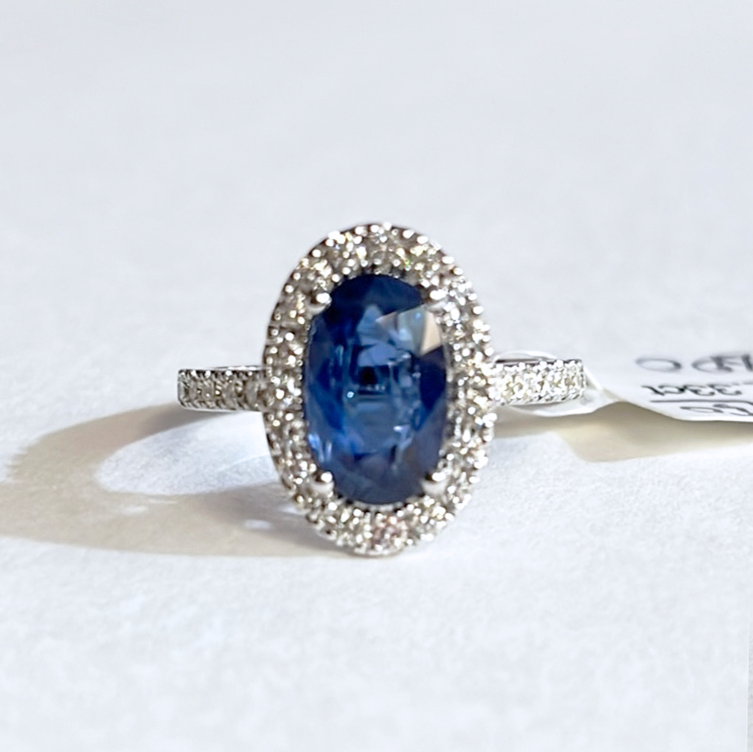 Oval Blue Sapphire Diamond Halo Ring
